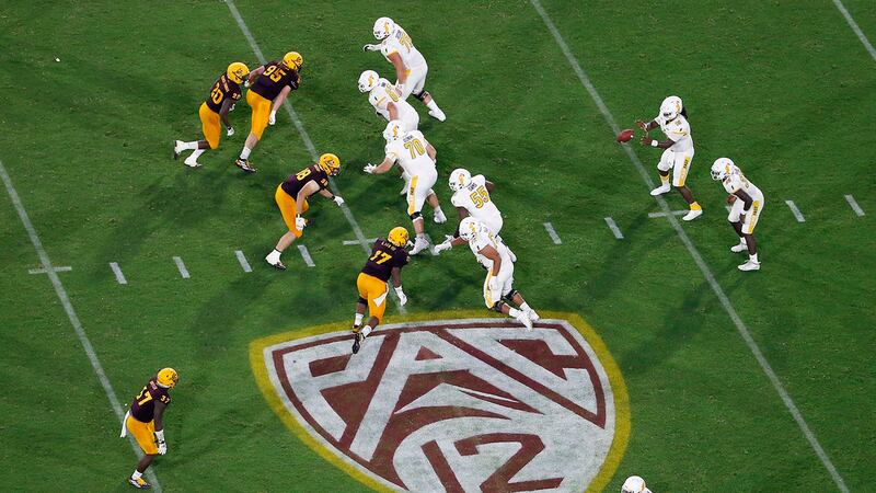 FILE - The Pac-12 logo is shown during the second half of an NCAA college football game...