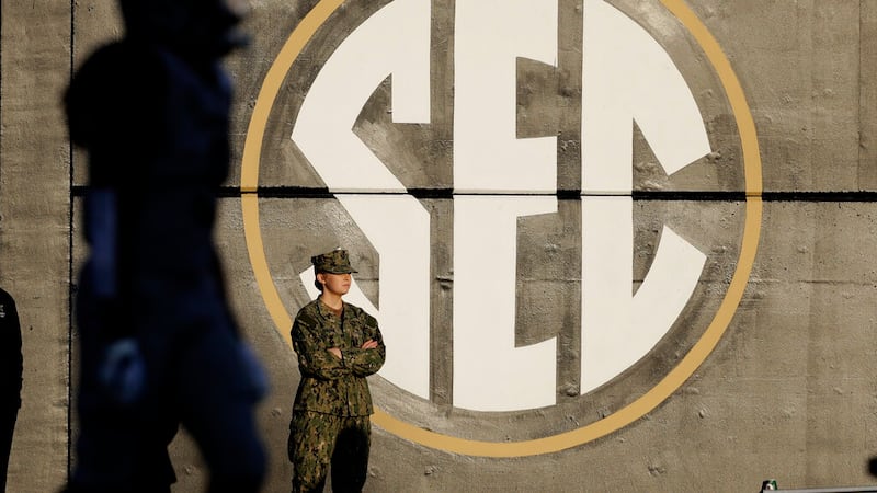 An SEC logo is painted on the wall inside Vanderbilt Stadium in the first half of an NCAA...