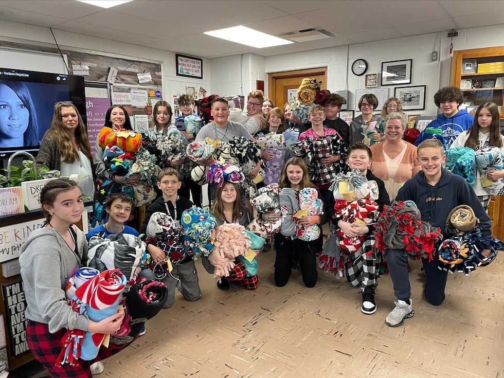 Jackson Middle School 7th graders made blankets for domestic violence victims.