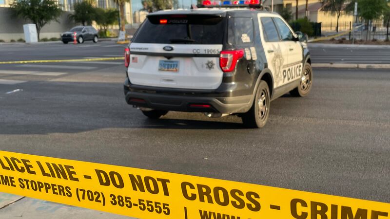 Las Vegas police said a woman was stabbed and killed while sleeping outside of a business.